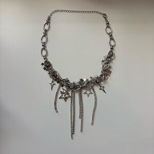 Silver star charm necklace with rhinestone tassels